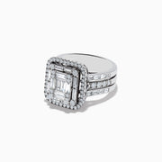 The 14K White Gold Diamond Ring features a rectangular emerald-cut diamond center, two rows of smaller round diamonds, and three diamond-accented bands on each side for a dazzling effect.