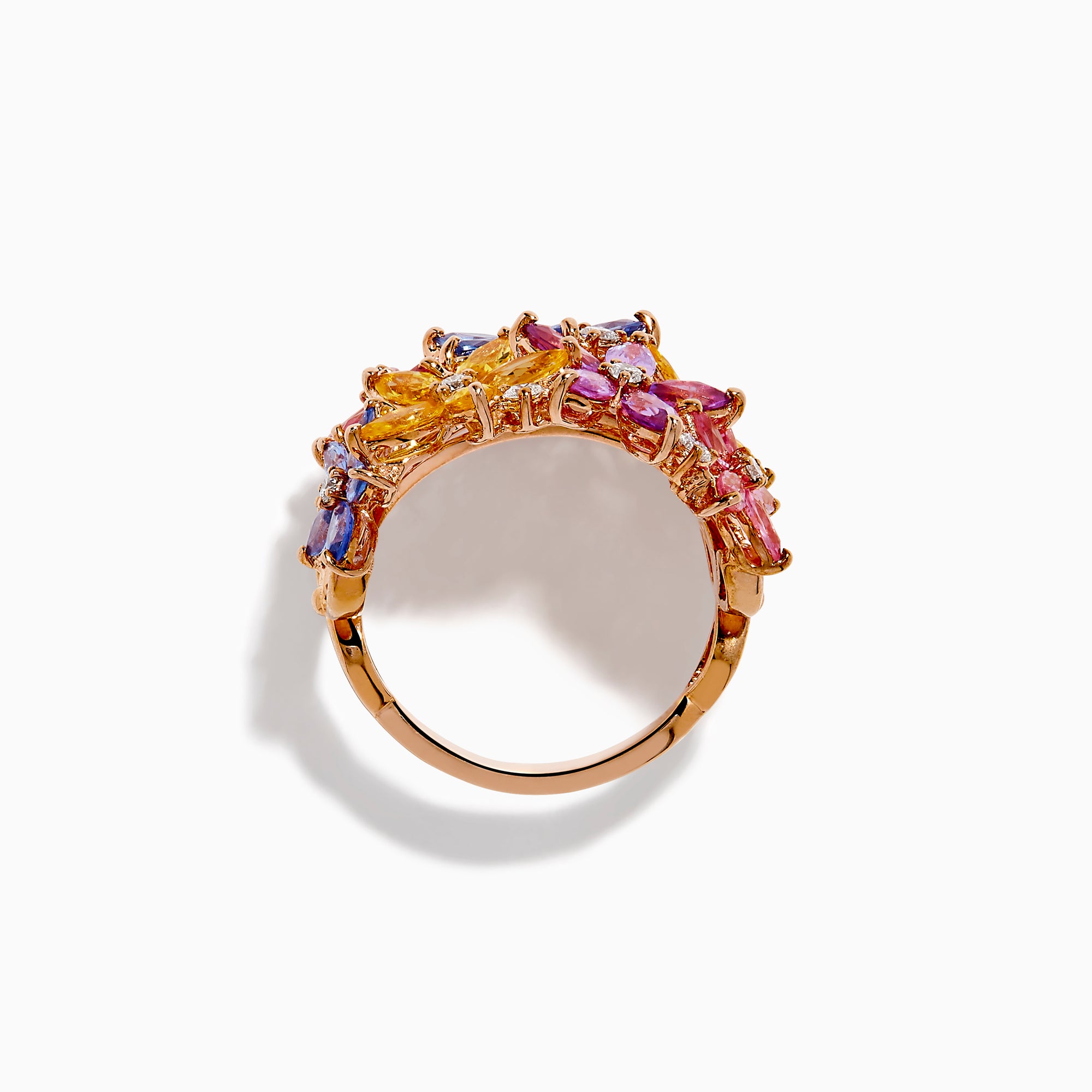 The Watercolors 14K Rose Gold Multi Sapphire and Diamond Flowers Ring showcases floral designs with blue, pink, yellow, and purple sapphires as petals, accented by small diamonds, set against a white background.