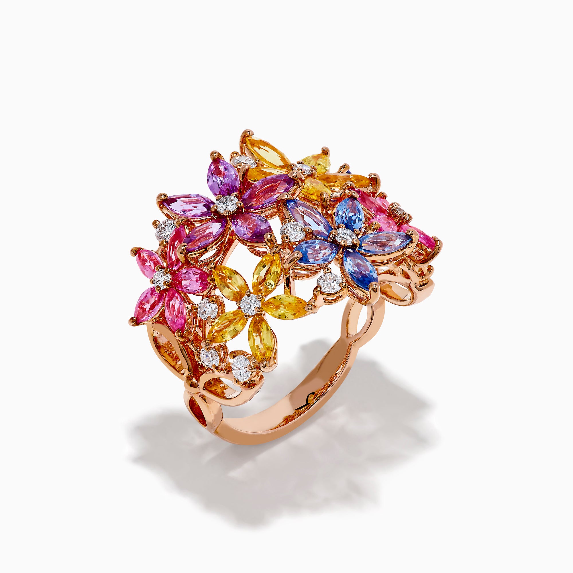 The Watercolors 14K Rose Gold Multi Sapphire and Diamond Flowers Ring showcases floral designs with blue, pink, yellow, and purple sapphires as petals, accented by small diamonds, set against a white background.