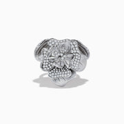 The 925 Sterling Silver Diamond Flower Ring features a blooming flower design with layered, gem-adorned petals, beautifully showcased against a plain white background.