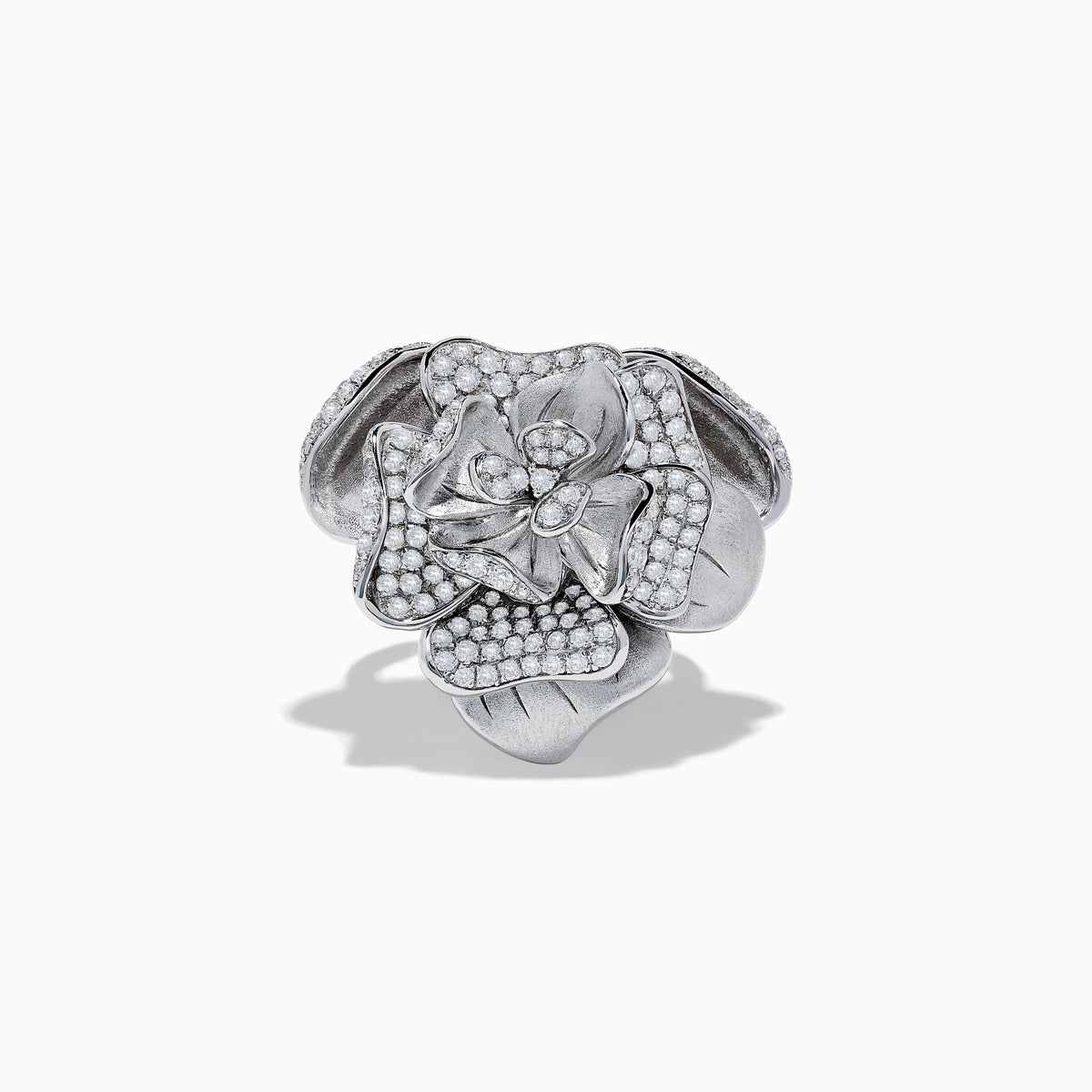 The 925 Sterling Silver Diamond Flower Ring features a blooming flower design with layered, gem-adorned petals, beautifully showcased against a plain white background.