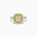 The Canare 14K Two Tone Gold White and Yellow Diamond Ring features a square cluster of four yellow diamonds, surrounded by a halo and band of sparkling white diamonds.