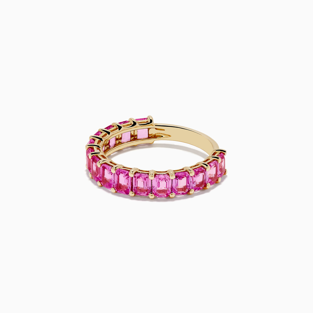 The 14k Yellow Gold Pink Sapphire Band Ring showcases a row of rectangular pink sapphires set around the band, presented on a white background.
