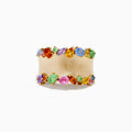The Watercolors 14K Yellow Gold Multi Sapphire Ring features a wide matte gold band adorned with colorful oval and round sapphires set along the top and bottom edges.