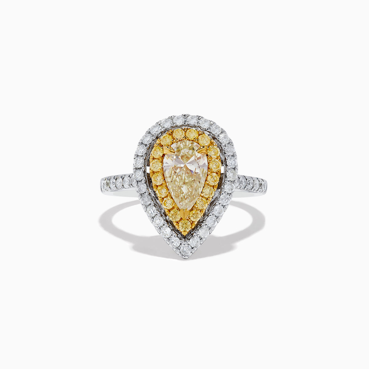 The Canare 14K Two-Tone Pear Shaped Double Halo Yellow Diamond Ring showcases a central clear diamond, haloed by yellow stones and white diamonds, set on a two-tone band accented with sparkling white diamonds.