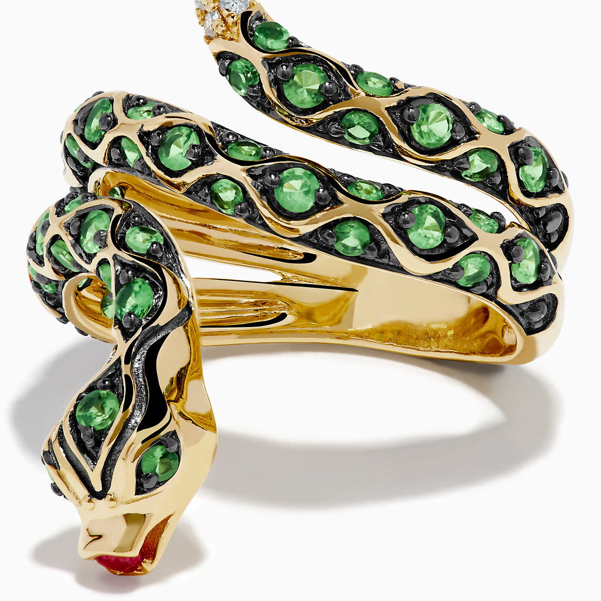The 14K Yellow Gold Tsavorite and Diamond Snake Ring features a coiled snake design with tsavorites along its body, a red gemstone on its head, and diamonds accenting the tail.