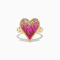 The Novelty 14K Yellow Gold Pink Sapphire and Diamond Heart Ring features a large heart-shaped design with pink sapphires and diamonds in a gradient pattern, set against a white background.