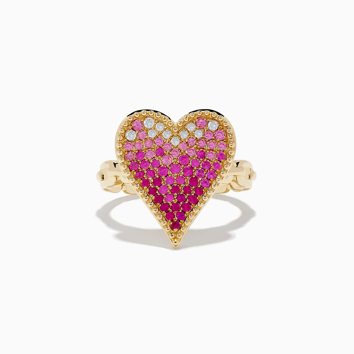 The Novelty 14K Yellow Gold Pink Sapphire and Diamond Heart Ring features a large heart-shaped design with pink sapphires and diamonds in a gradient pattern, set against a white background.