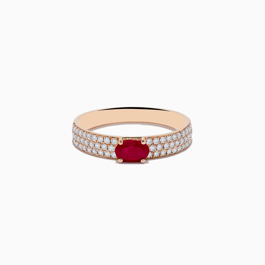 The Ruby Royale 14K Rose Gold Ruby and Diamond Ring features an oval ruby center stone with rows of round white diamonds along the band, beautifully showcased on a white background.