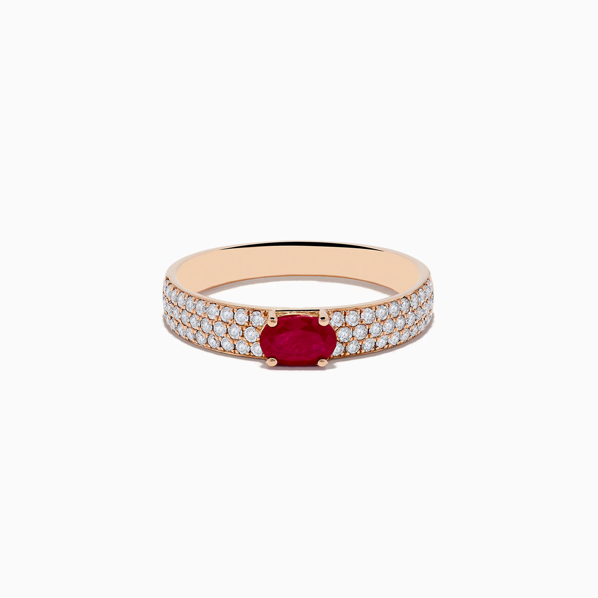 The Ruby Royale 14K Rose Gold Ruby and Diamond Ring features an oval ruby center stone with rows of round white diamonds along the band, beautifully showcased on a white background.