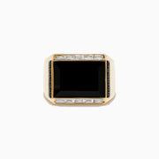 The Mens 14K Yellow Gold Onyx and Diamond Ring features a large rectangular onyx centerpiece, framed by rows of baguette-cut diamonds on a thick, glossy band with a bold modern design.
