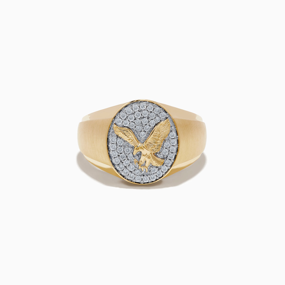 The 14K Yellow Gold Diamond Eagle Signet Ring features a round face with a raised eagle in flight set against sparkling diamond-like white stones.
