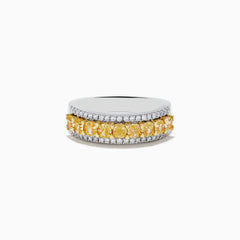 The Canare 18k Two Tone Gold Cushion Cut Yellow Diamond Band (1.70 TCW) features a central row of cushion cut yellow diamonds, bordered by two rows of small clear diamonds, set against polished gold.