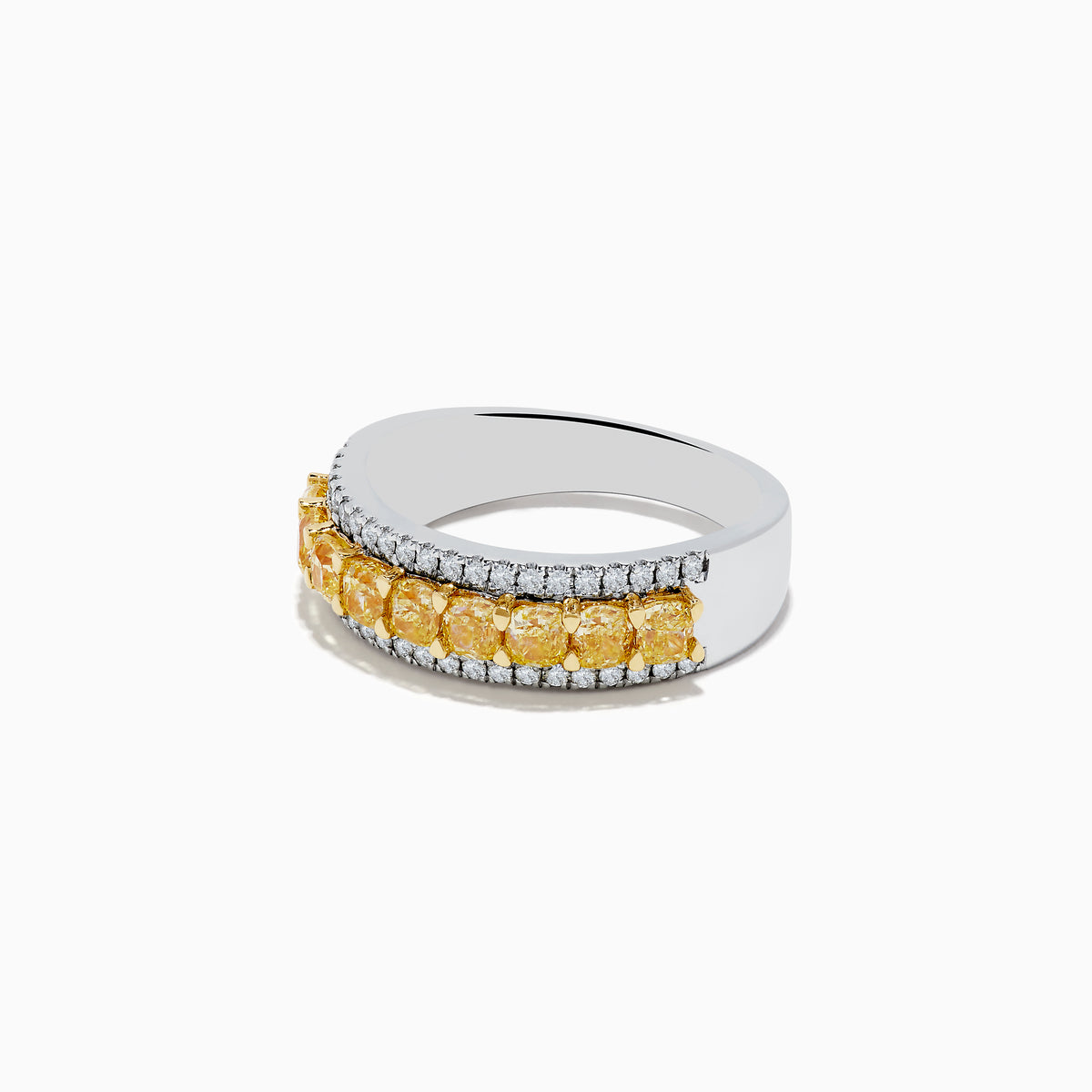 The Canare 18k Two Tone Gold Cushion Cut Yellow Diamond Band (1.70 TCW) features a central row of cushion cut yellow diamonds, bordered by two rows of small clear diamonds, set against polished gold.
