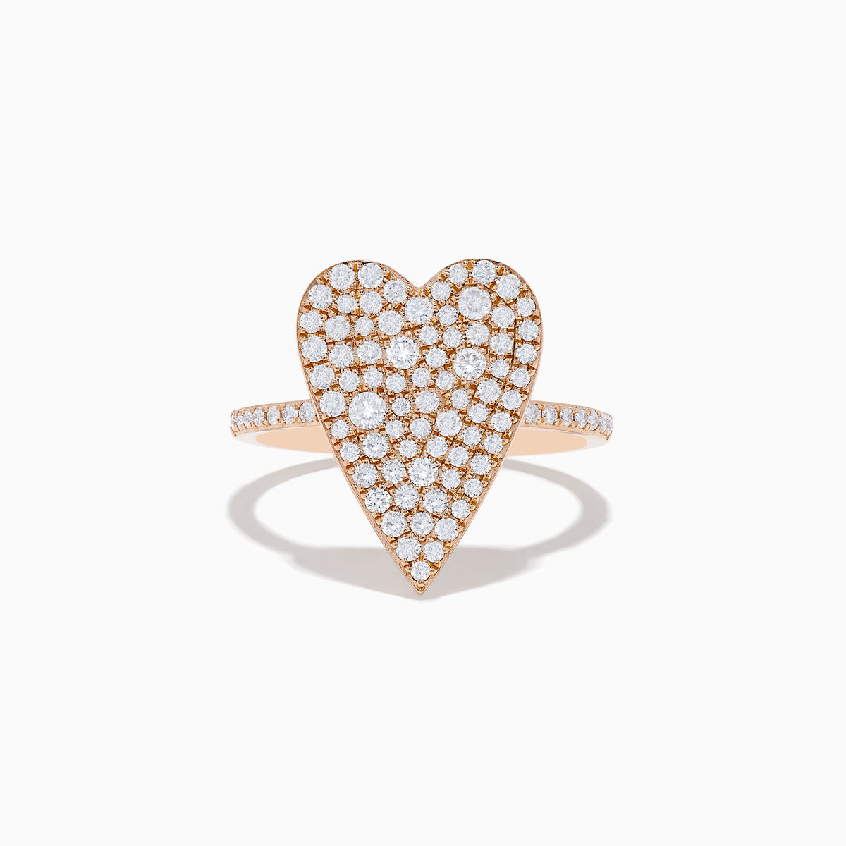 The Pave Rose 14K Rose Gold Diamond Heart Ring features a large diamond-encrusted heart centerpiece with additional diamonds along the band, shown on a white background.