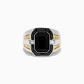 The Mens 14K White & Yellow Gold White and Black Diamond Onyx Ring features a large rectangular black onyx centerpiece, surrounded by white and black diamonds, with sparkling gems accenting the band.