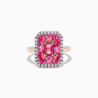 The 14K Rose Gold Pink Sapphire and Diamond Ring showcases multiple oval pink sapphires at the center, bordered by round white diamonds, creating an elegant and brilliant jewelry piece.