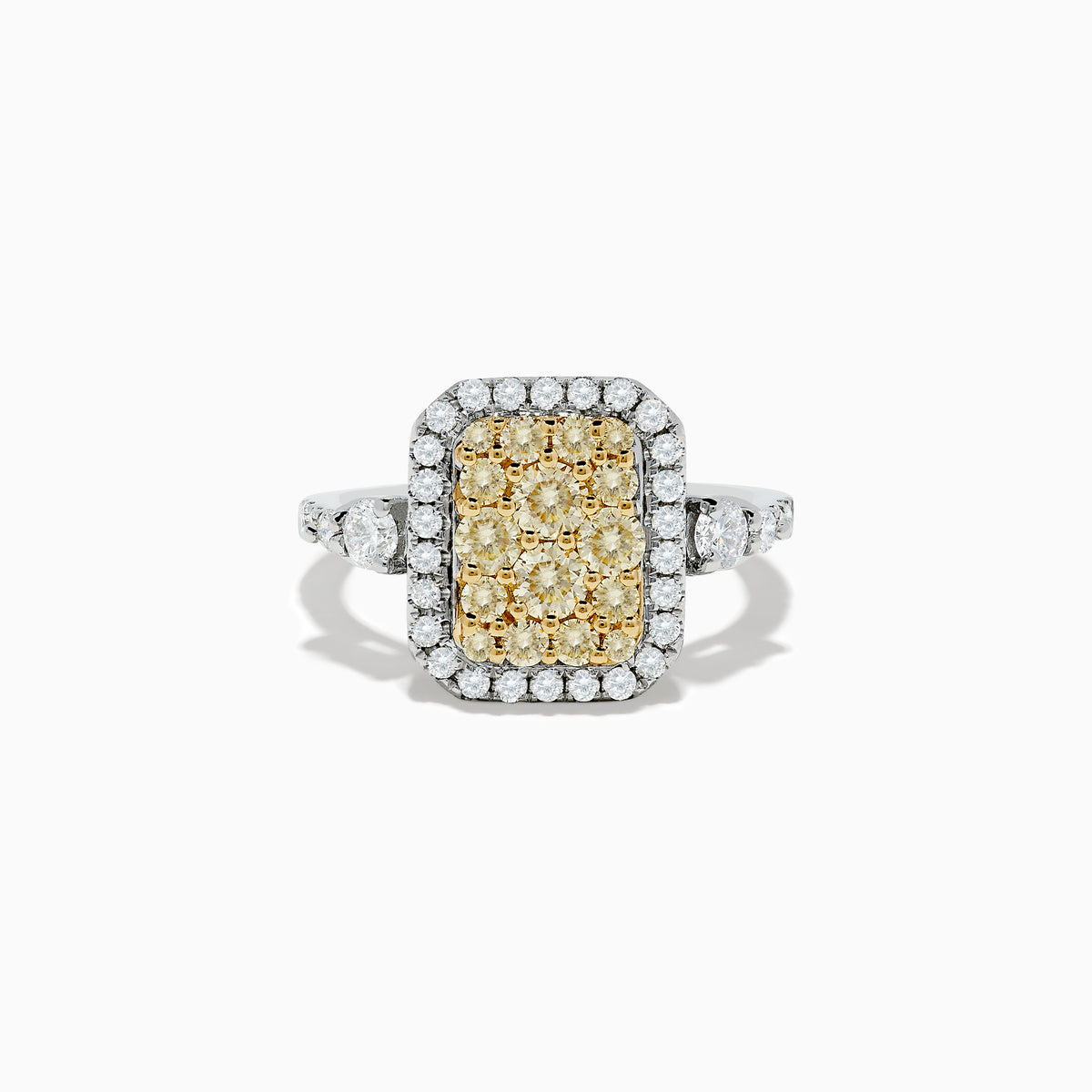 The Canare` 14K Two Tone Gold White and Yellow Diamond Ring showcases a cluster of yellow diamonds at the center, surrounded by white diamonds on a rectangular band.