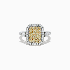 The Canare` 14K Two Tone Gold White and Yellow Diamond Ring showcases a cluster of yellow diamonds at the center, surrounded by white diamonds on a rectangular band.