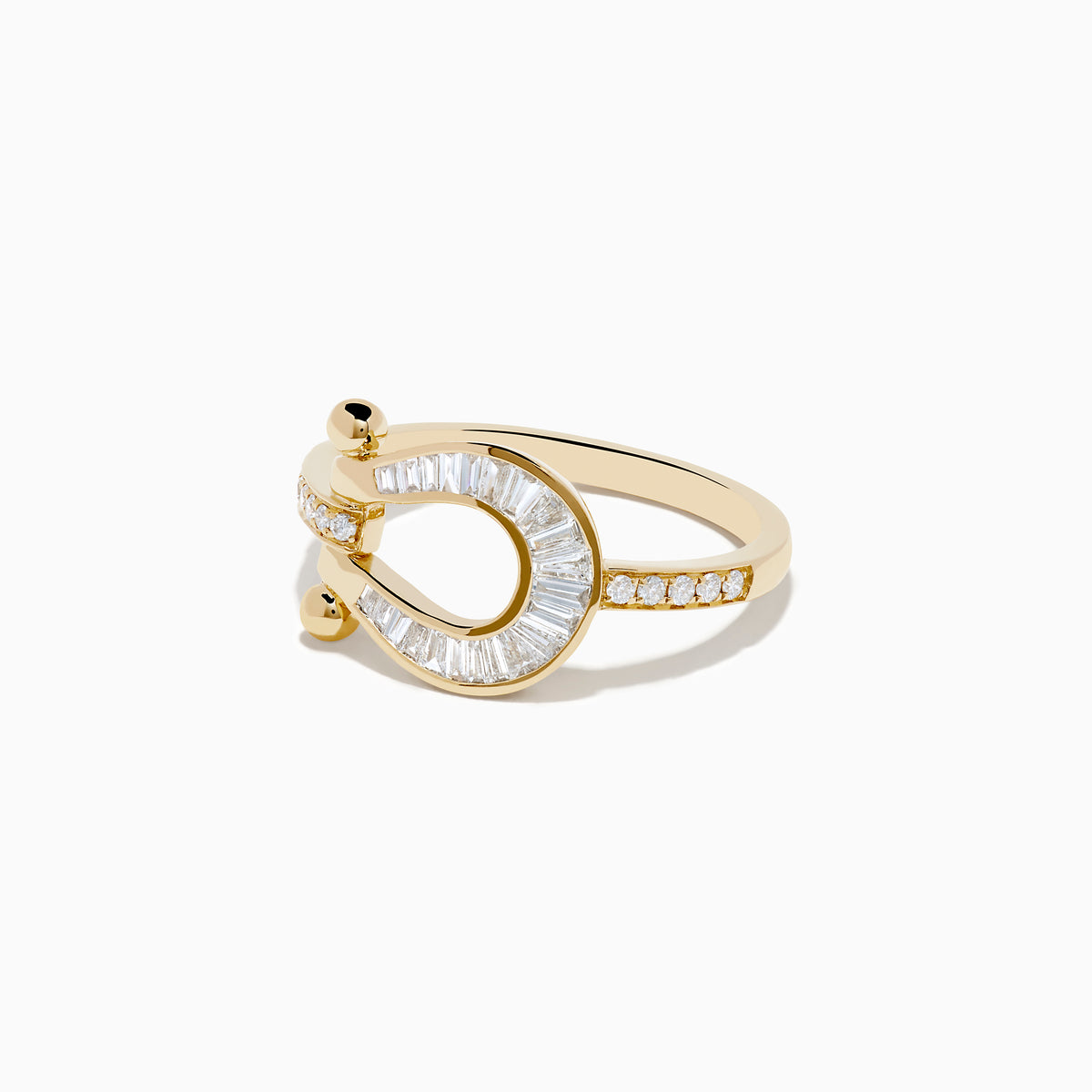 The Novelty 14K Yellow Gold Diamond Horseshoe Ring features baguette-cut diamonds and two small gold spheres at each end, elegantly displayed on a white background.