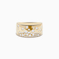 The DOro 14K Yellow Gold Scattered Diamonds Ring features a wide band adorned with round, sparkling white diamonds of varying sizes across the front, creating an elegant, textured pattern.