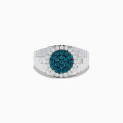 The Mens 14K White Gold Blue and White Diamond Ring features a round face with blue diamonds at the center, encircled by a border of sparkling white stones.