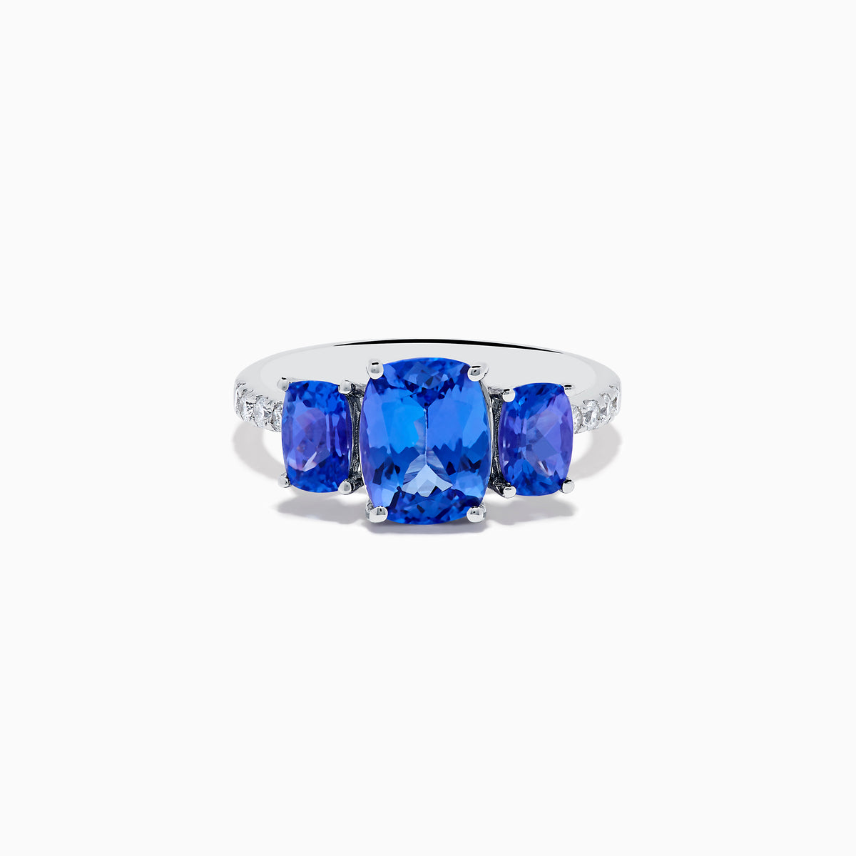 The Nahla 14K White Gold Tanzanite and Diamond 3 Stone Ring showcases three rectangular blue tanzanites at the center, accented by sparkling diamonds along the band.