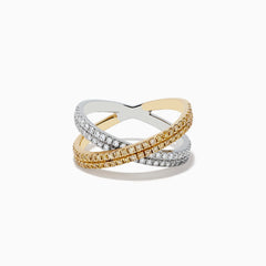 The Canare 14k Two Tone Yellow and White Diamond Criss Cross Ring (0.78 TCW) features intersecting bands—one adorned with white diamonds, the other with yellow—for a dazzling contrast against a white background.