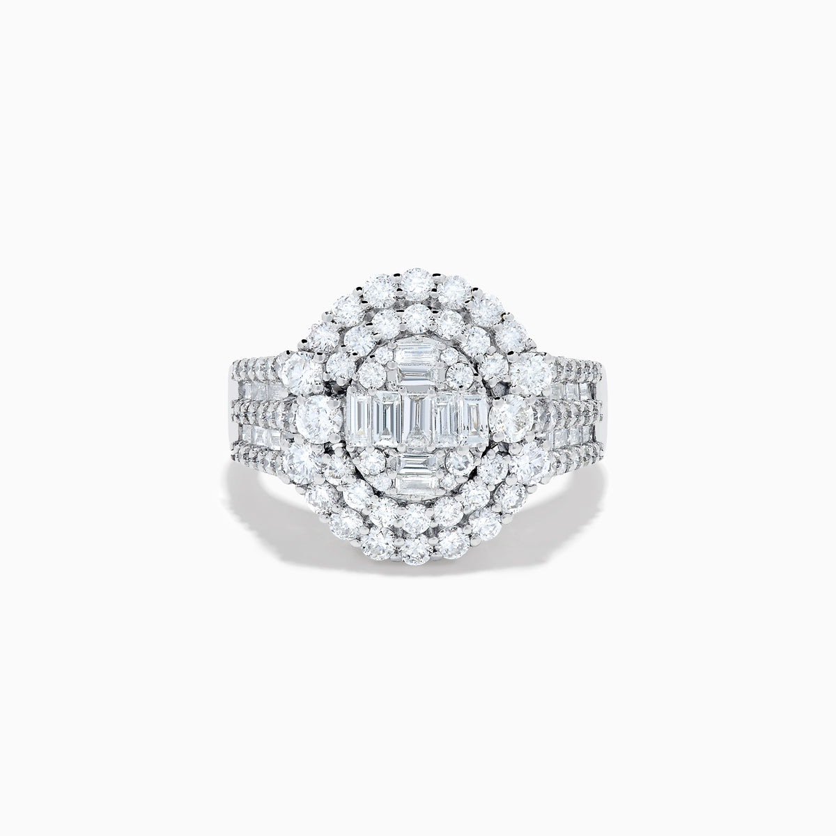 The 14K White Gold Diamond Cluster Ring showcases rectangular and round-cut diamonds in an oval setting with two halo layers on a diamond-accented split shank band.
