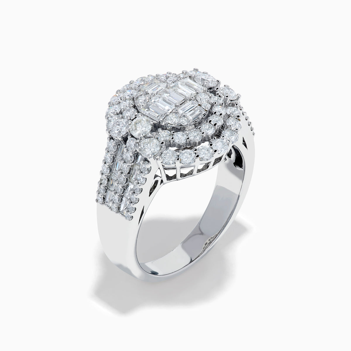 The 14K White Gold Diamond Cluster Ring showcases rectangular and round-cut diamonds in an oval setting with two halo layers on a diamond-accented split shank band.