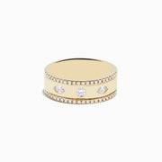 The DOro 14K Yellow Gold Diamond Ring features small edge diamonds and three larger center stones, beautifully displayed against a white background.