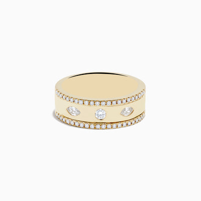 The DOro 14K Yellow Gold Diamond Ring features small edge diamonds and three larger center stones, beautifully displayed against a white background.