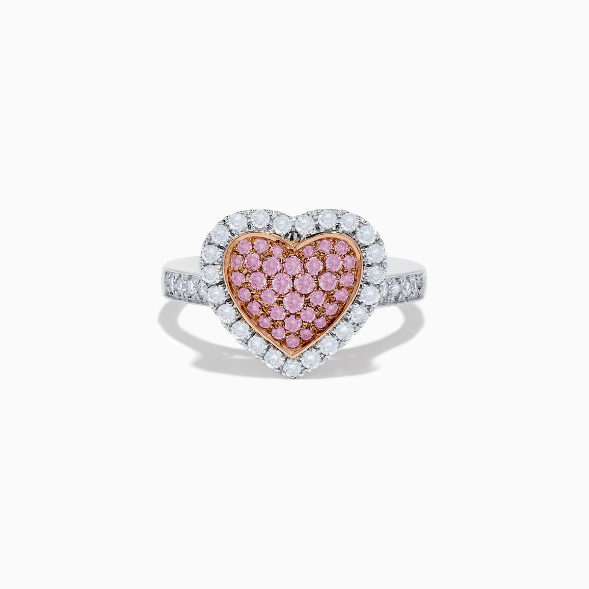 The Novelty 14K Two Tone Gold Pink and White Diamond Heart Ring features a heart-shaped centerpiece set with pink and white diamonds, accented by a sparkling border of clear, white stones.