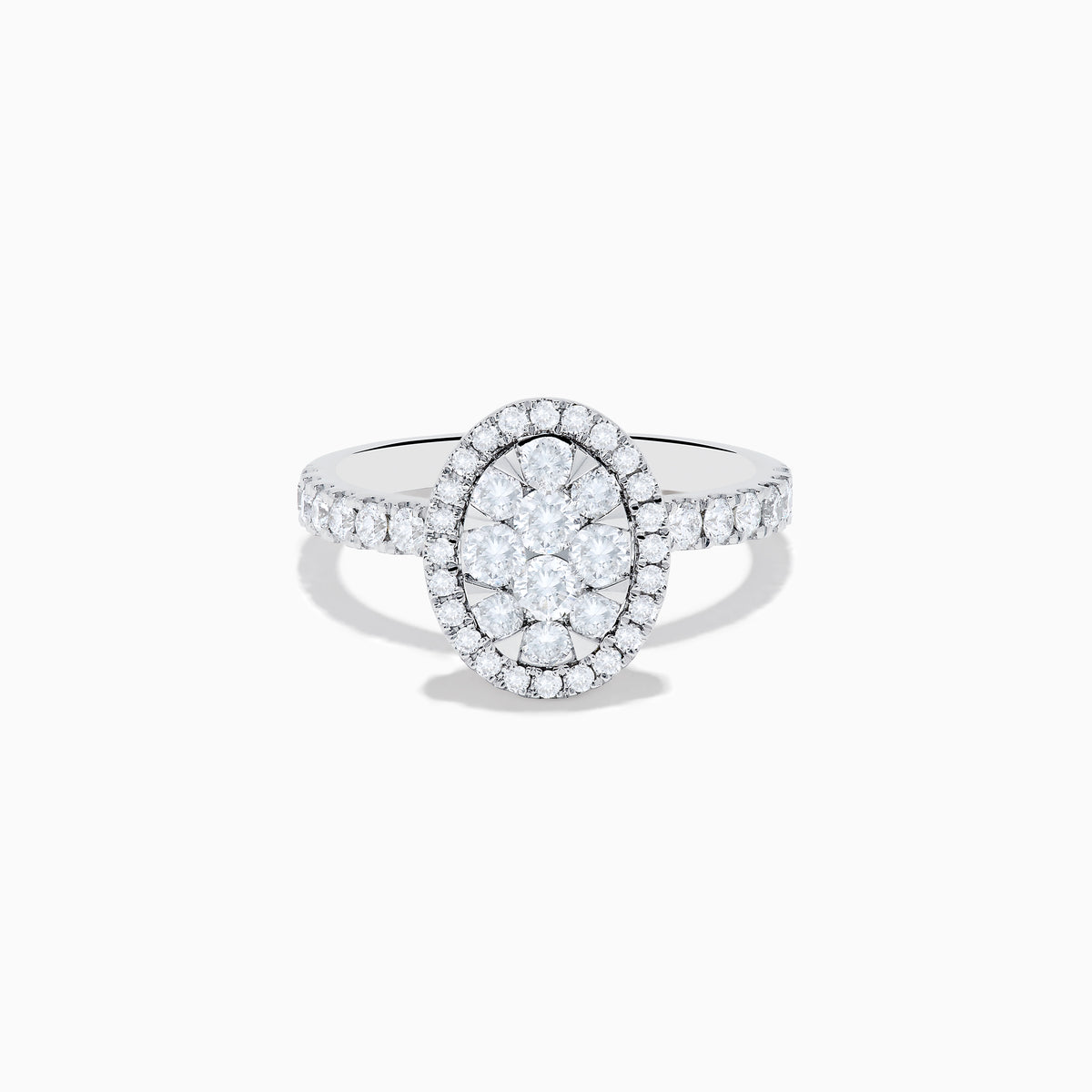 The Bouquet 14K White Gold Diamond Cluster Ring showcases an oval diamond cluster with a double halo of sparkling diamonds and extra diamonds set along the band.