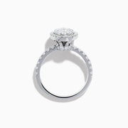 The Bouquet 14K White Gold Diamond Cluster Ring showcases an oval diamond cluster with a double halo of sparkling diamonds and extra diamonds set along the band.