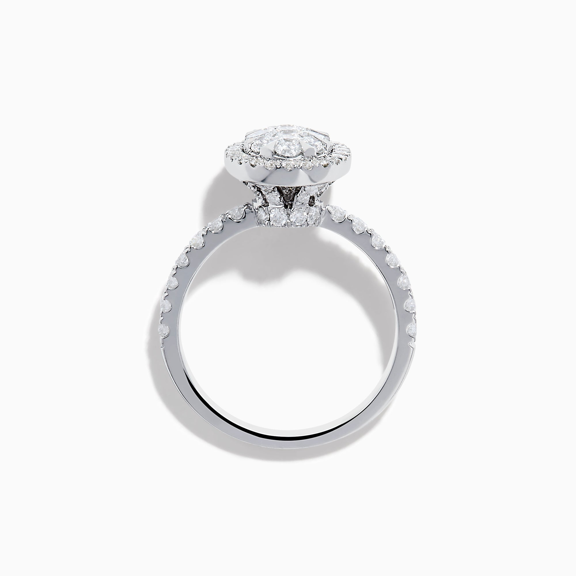 The Bouquet 14K White Gold Diamond Cluster Ring showcases an oval diamond cluster with a double halo of sparkling diamonds and extra diamonds set along the band.
