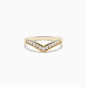 The 14K Yellow Gold Contoured Diamond Band Ring features a row of small round diamonds set along its V-shaped front and is displayed on a plain white background.