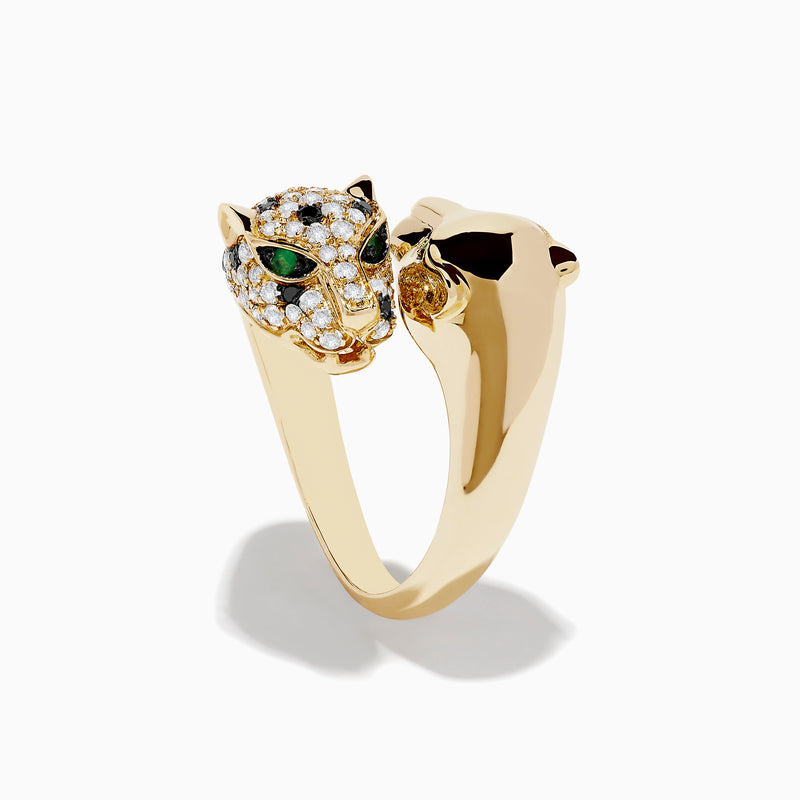 The Signature 14K Yellow Gold Diamond and Emerald Double Panther Ring showcases two panther heads—one with smooth gold and emerald-green gem eyes, the other adorned with sparkling diamonds and black gemstones—set on a white background.