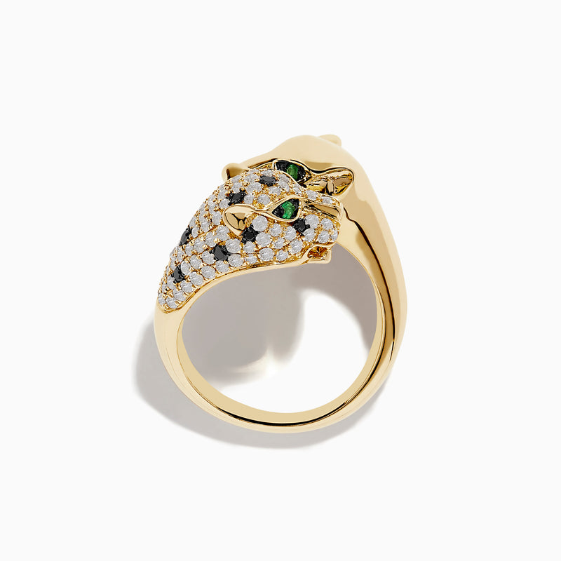 The Signature 14K Yellow Gold Diamond and Emerald Double Panther Ring showcases two panther heads—one with smooth gold and emerald-green gem eyes, the other adorned with sparkling diamonds and black gemstones—set on a white background.