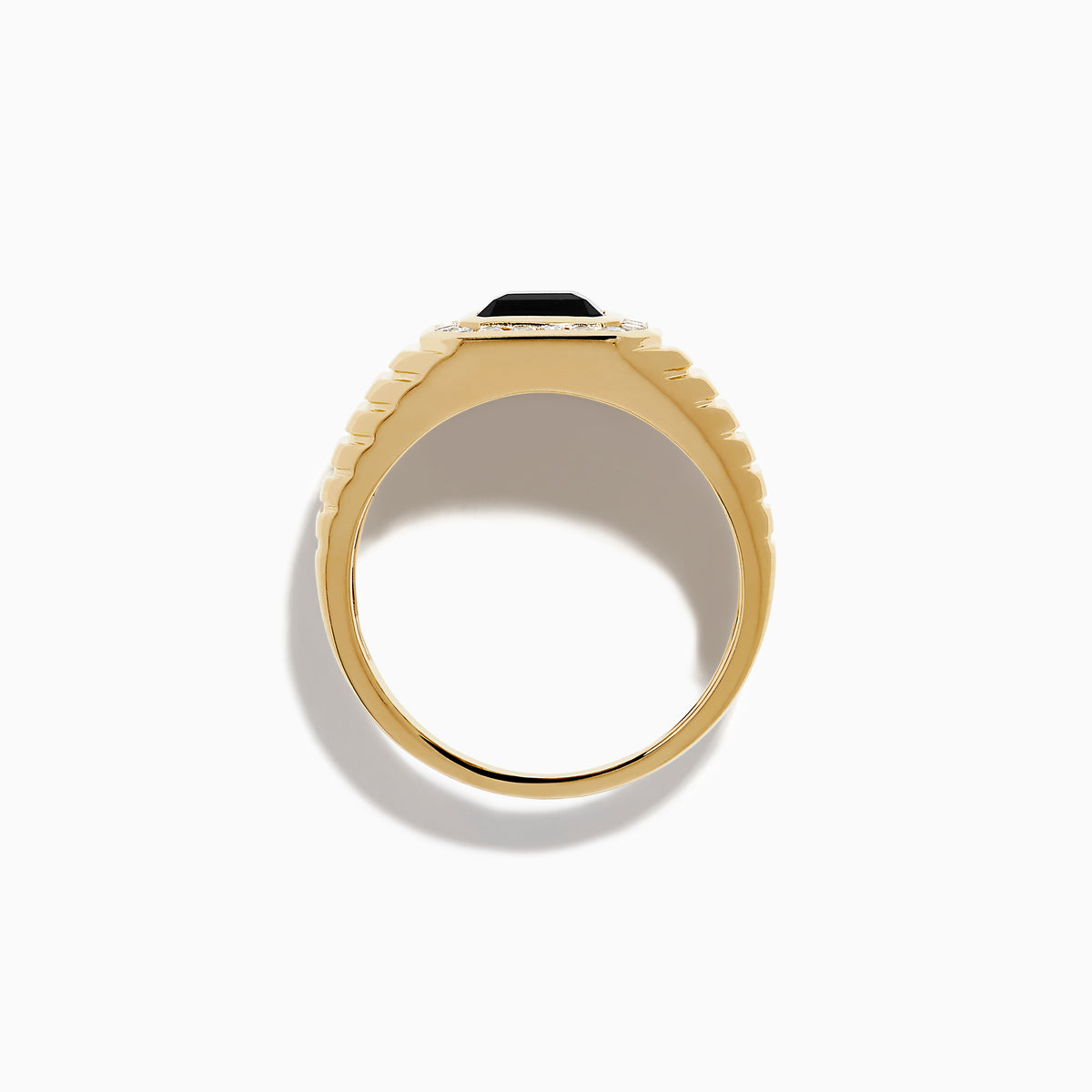 The Men's 14K Yellow Gold Onyx and Diamond Signet Ring showcases a rectangular black onyx centerpiece bordered by clear diamonds, with a ribbed band for added elegance.