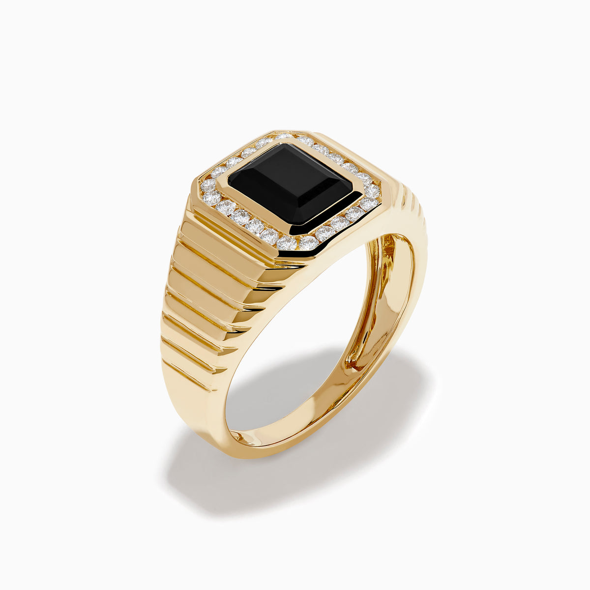 The Men's 14K Yellow Gold Onyx and Diamond Signet Ring showcases a rectangular black onyx centerpiece bordered by clear diamonds, with a ribbed band for added elegance.