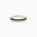 The 14K Yellow Gold Sapphire and Diamond Stacked Band Ring features two rows: sapphires on top and clear, diamond-like stones below, displayed on a white background.
