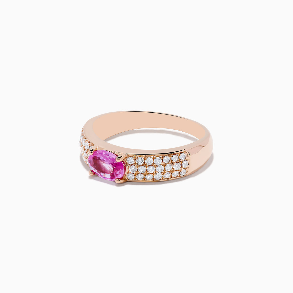 The 14K Rose Gold Pink Sapphire and Diamond Ring showcases a central oval pink sapphire, accented by rows of sparkling round diamonds along the band.