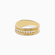 The Mens 14K Yellow Gold Diamond Ring features a central row of small round diamonds set in a channel, accented by delicate engraved details on each side.