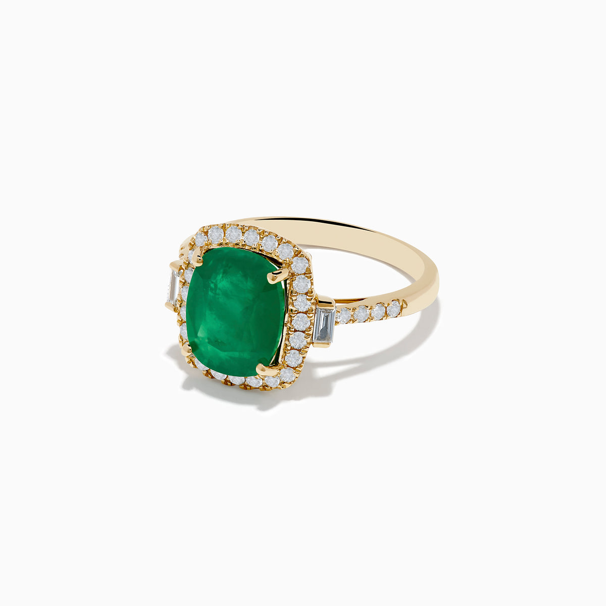 The Brasilica 14K Yellow Gold Emerald and Diamond Ring features a striking rectangular emerald at the center, surrounded by round and baguette-cut diamonds, with diamond accents along the band.