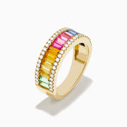 The Watercolors 14K Yellow Gold Multi Color Sapphire and Diamond Ring features a row of rectangular sapphires in rainbow order, bordered by sparkling diamonds along the top and bottom, shown against a white background.