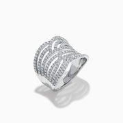 The 14K White Gold Diamond Pave Multi-Row Infinity Crossover Ring features interwoven, wave-like bands encrusted with diamonds for an elegant look and is shown against a plain white background.