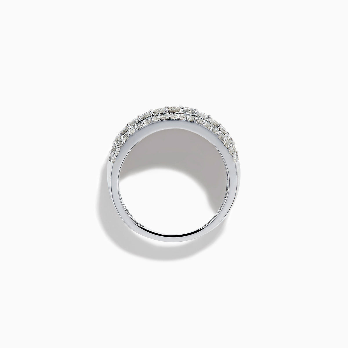 The 14K White Gold Diamond Wide Band Statement Ring showcases multiple rows of closely set round white diamonds, creating a dazzling and luxurious look against its wide, polished band. The background is plain white.