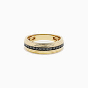 The Men's 14K Yellow Gold Black Diamond Textured Ring features a ridged, textured band and a central row of black diamonds—a bold statement piece for men.