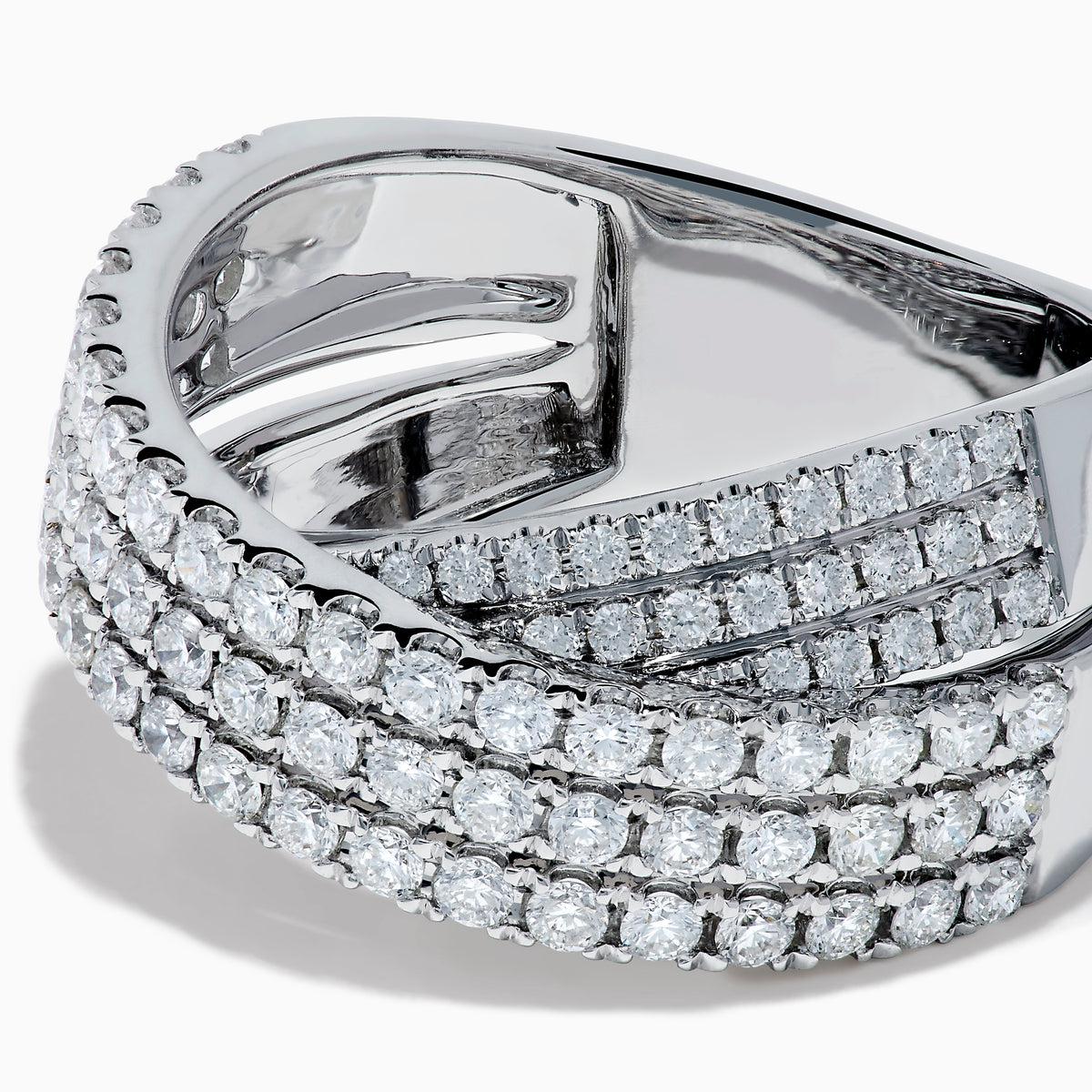 The Classique 14K White Gold Diamond Criss Cross Ring features three overlapping, diamond-encrusted bands and is displayed on a plain white background.